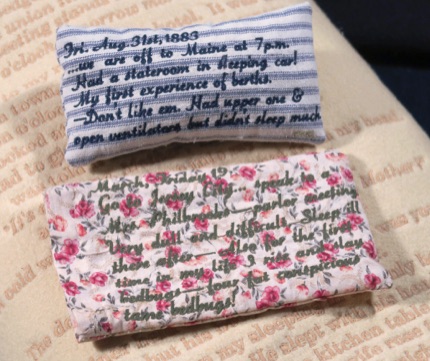 Unique artist book bed, antique wood doll bed, embroidered stories text traveling west, oregon trail, vintage and recycled textiles pillows, pillowcases