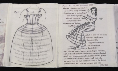 Conventional Burdens crinoline bird cage book, interior pages Side 1 with sheer page that reveals another of woman wearing crinoline