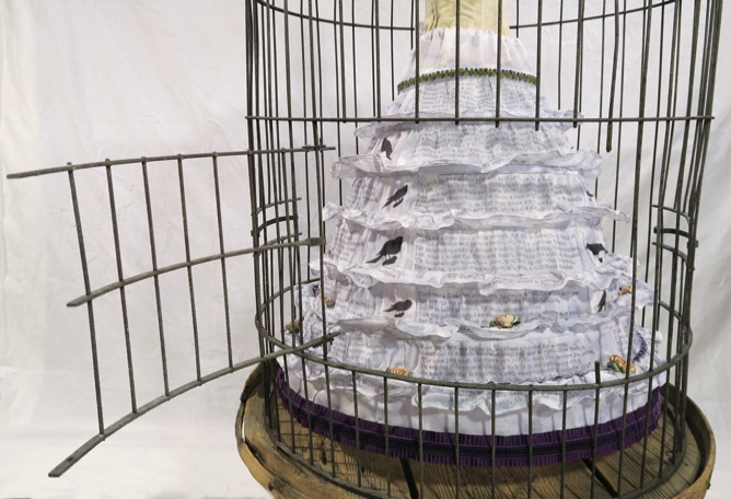 Unique artist book corset series, victorian bird cage, cage with hanging corset, crinoline with cage door open